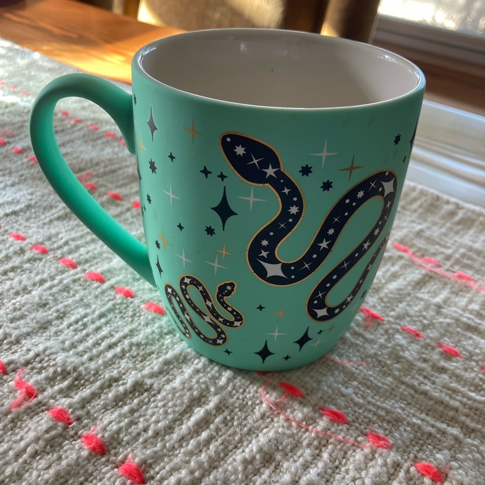 Mint Green Ceramic Mug with Starry Snake Design